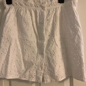 White eyelet 15 in mini skirt